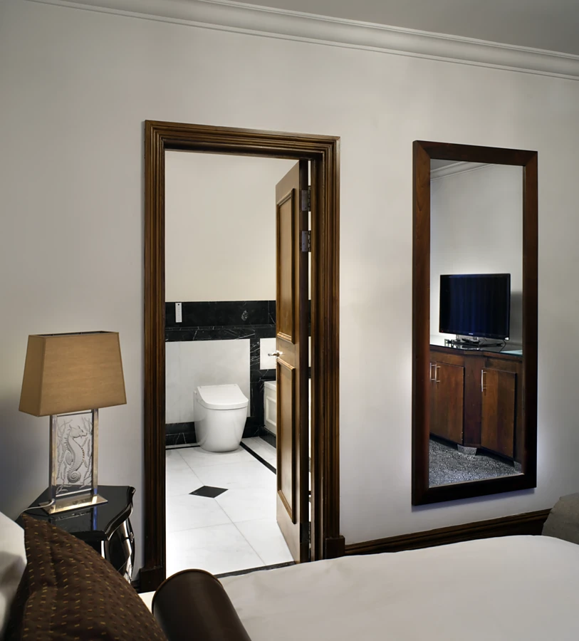 <p>The Lalique Suite of the Courthouse Hotel pays homage to the great designer Rene Lalique. The suite is 110sqm. Seen here through the ensuite is TOTO RG Lite. Photo: TOTO</p>